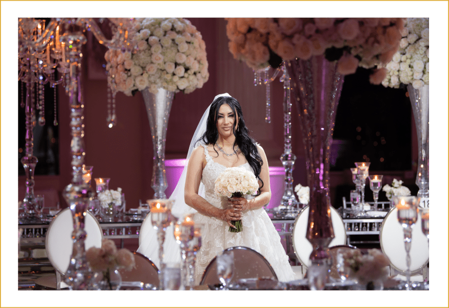Bride holding flowers and smiling